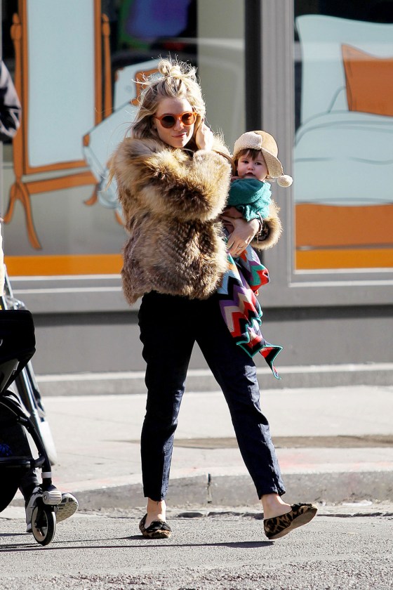 Sienna Miller takes her baby daughter Marlowe for a stroll around Soho in New York City