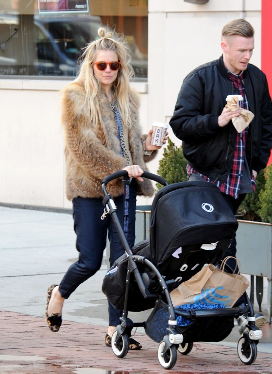 Sienna Miller takes her baby daughter Marlowe for a stroll around Soho in New York City