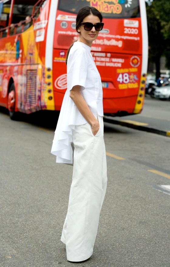 STREET-STYLE-WHITE-PEPLUM-AND-FRILLS-MILAN-FASHION-WEEK-PEPLUM-BACK-TOP-WIDE-LEG-WHITE-PANT-VIA-VOGUE-UK-Leila-Yavari